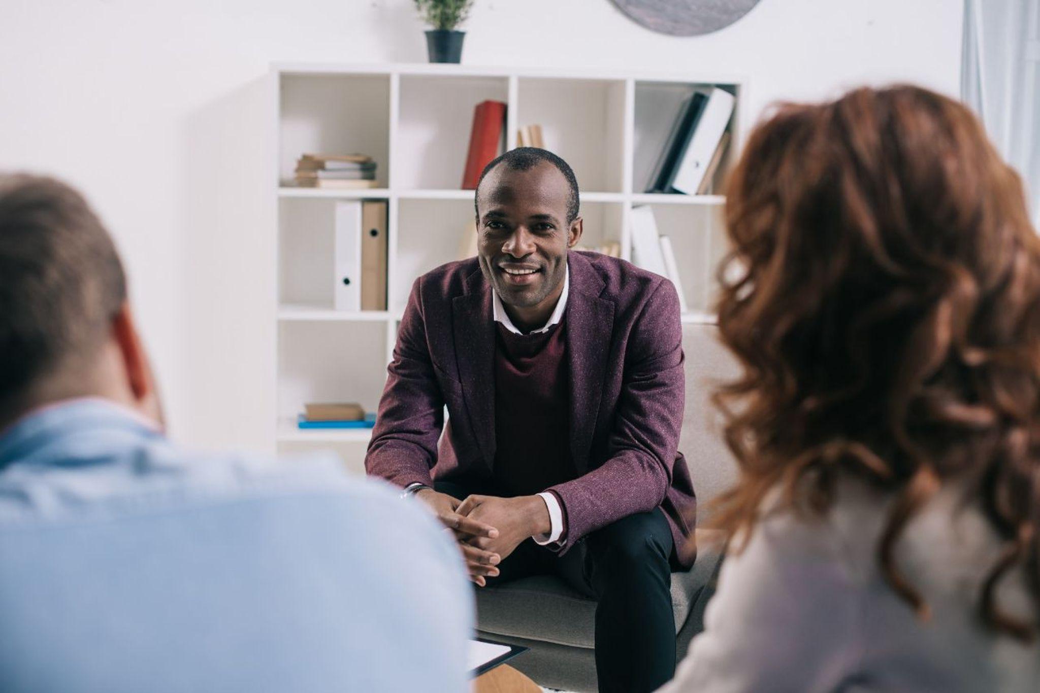 therapist talking with couple