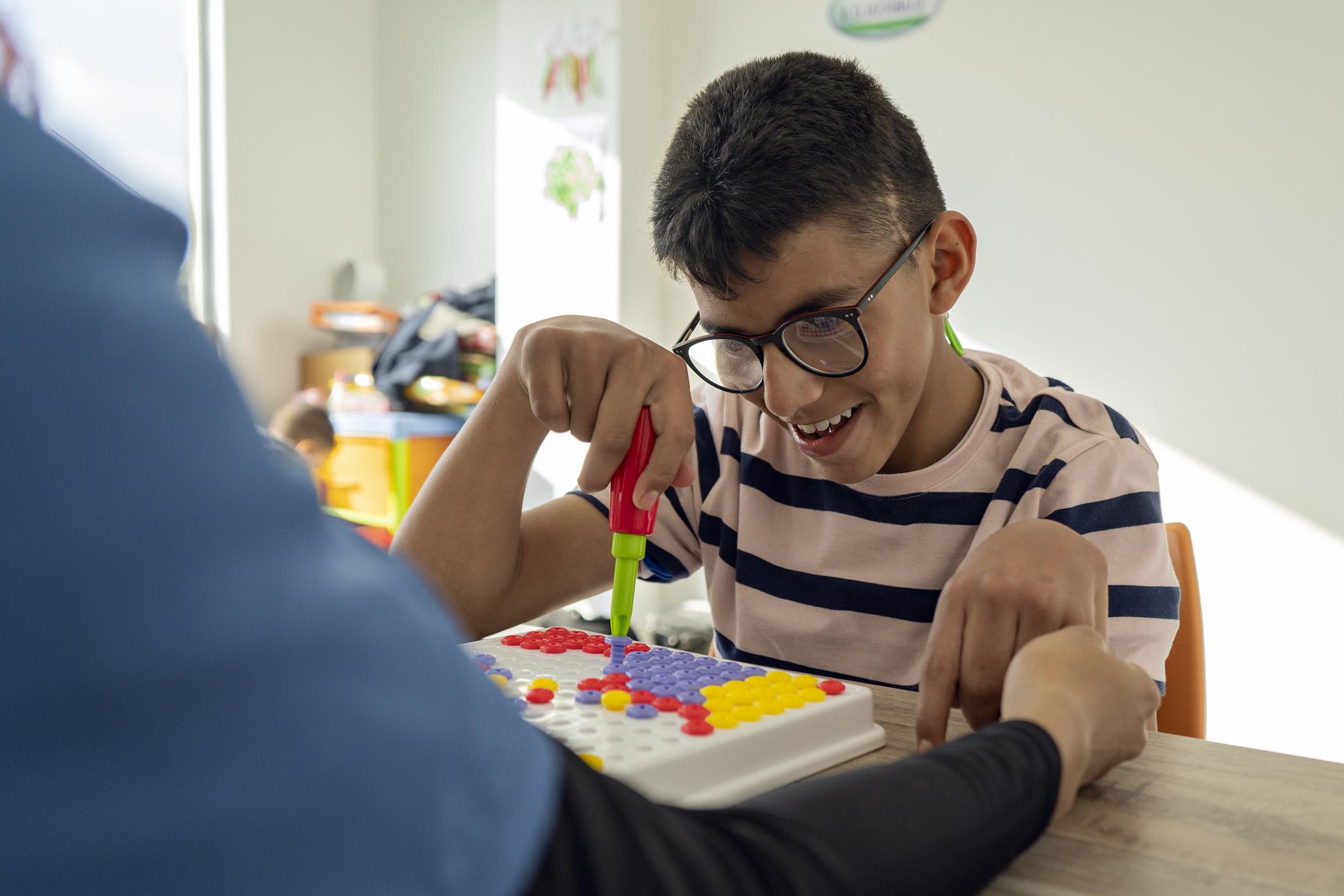 therapist working with child